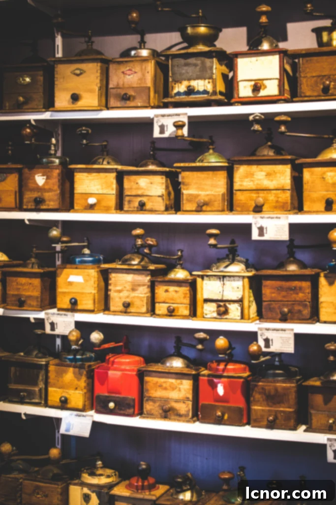 10 Paris Insider Spots: Experience the City Like a Local 8 a wall full of coffee grinders in the marché saint ouen France, a non-touristy shopping experience