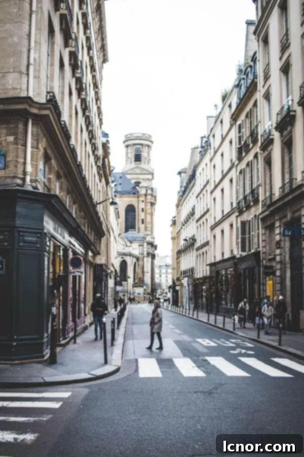 A charming narrow street in Saint Germain, Paris, France, perfect for a leisurely stroll.