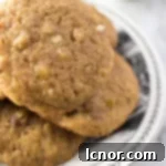 Stacked date cookies on a plate, ready to be enjoyed.
