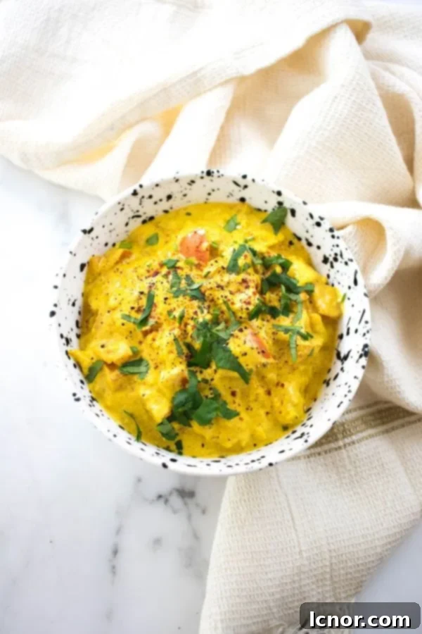 Authentic Chicken Karahi, a rich Indian and Pakistani chicken curry, in a serving bowl