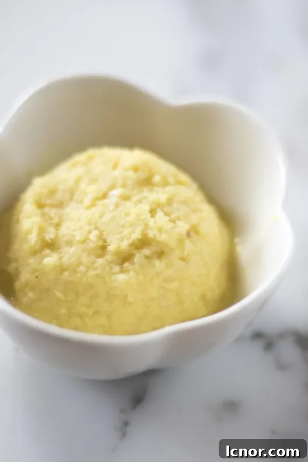 Garlic ginger paste in a small white bowl 