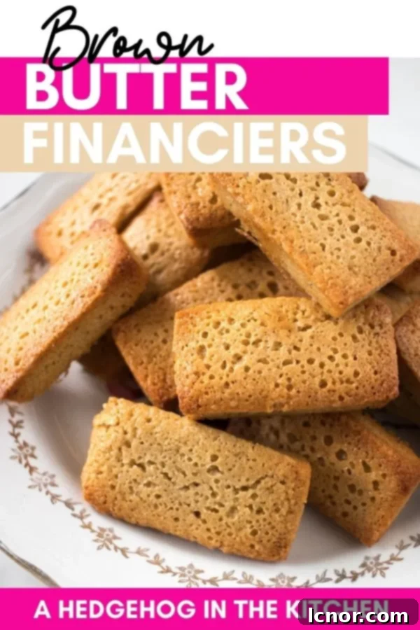 Pinterest pin for Brown Butter Financiers recipe, featuring a stack of delicious pastries.