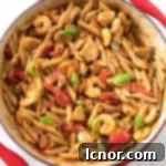 overhead photo of cajun chicken and shrimp pasta in a pan