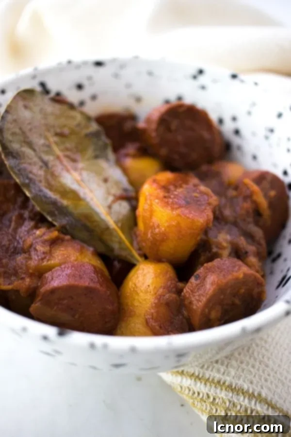 Close-up of patatas con chorizo, a Spanish potato and chorizo dish in a bowl