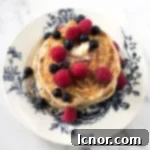Sourdough Pancakes on a blue and white plate