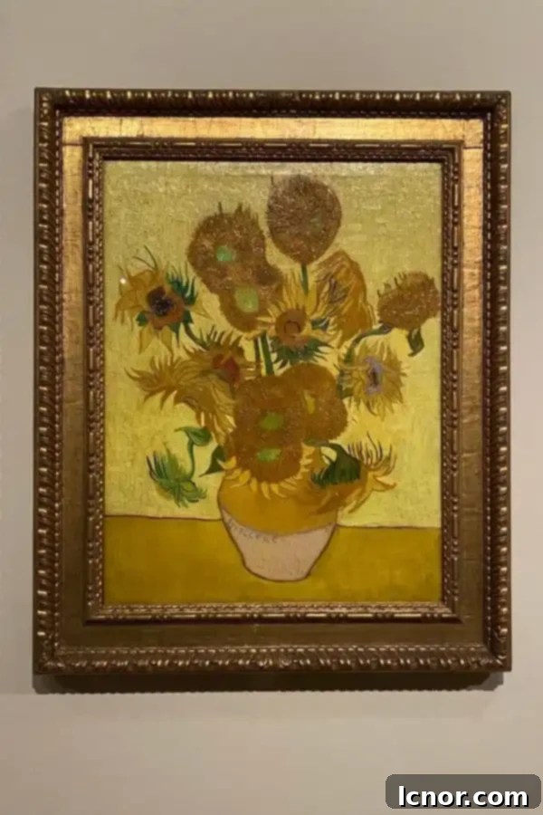 Vibrant painting of Sunflowers in a vase, a masterpiece by Van Gogh at the Van Gogh Museum, Amsterdam