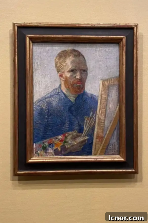 Self-Portrait as a Painter, 1887, by Van Gogh, depicting himself with a palette and brushes, at the Amsterdam museum.