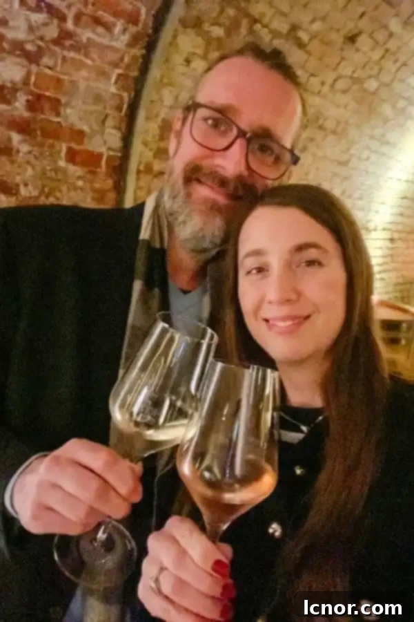Couple having wine in Vienna, Schlumberger Wine Cellar, one of the romantic things to do in Vienna Austria