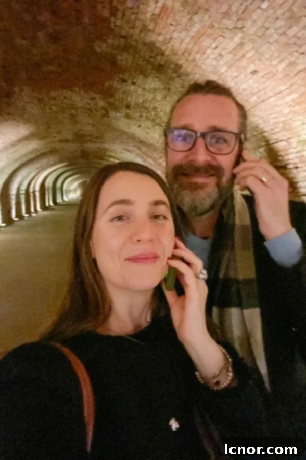 man and women with audio guide, wine tasting in Vienna, Schlumberger Wine Cellar