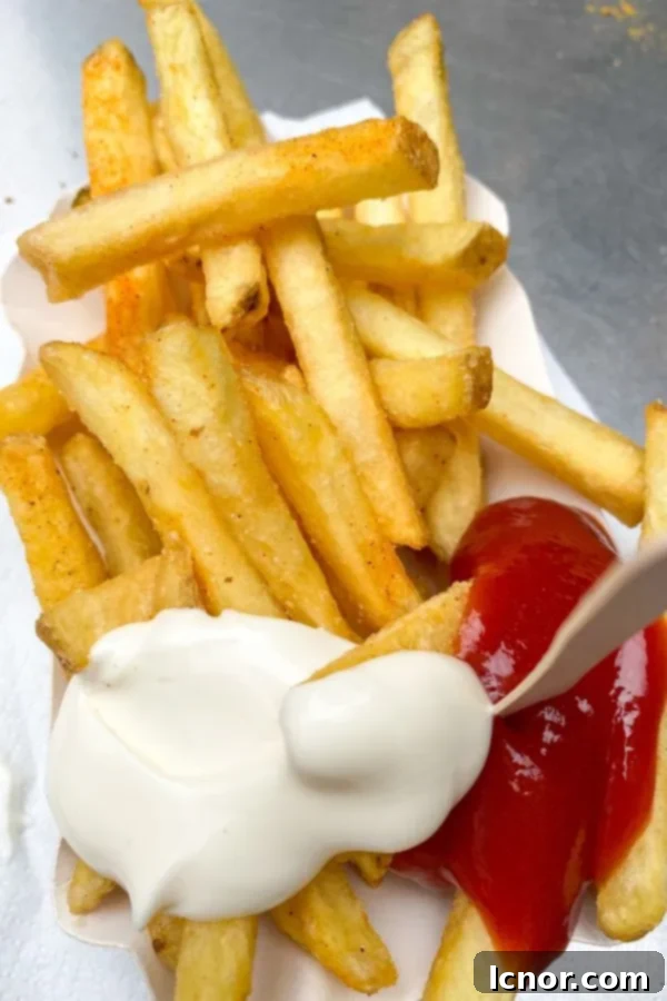 french fries with ketchup and mayonnaise in Vienna Austria