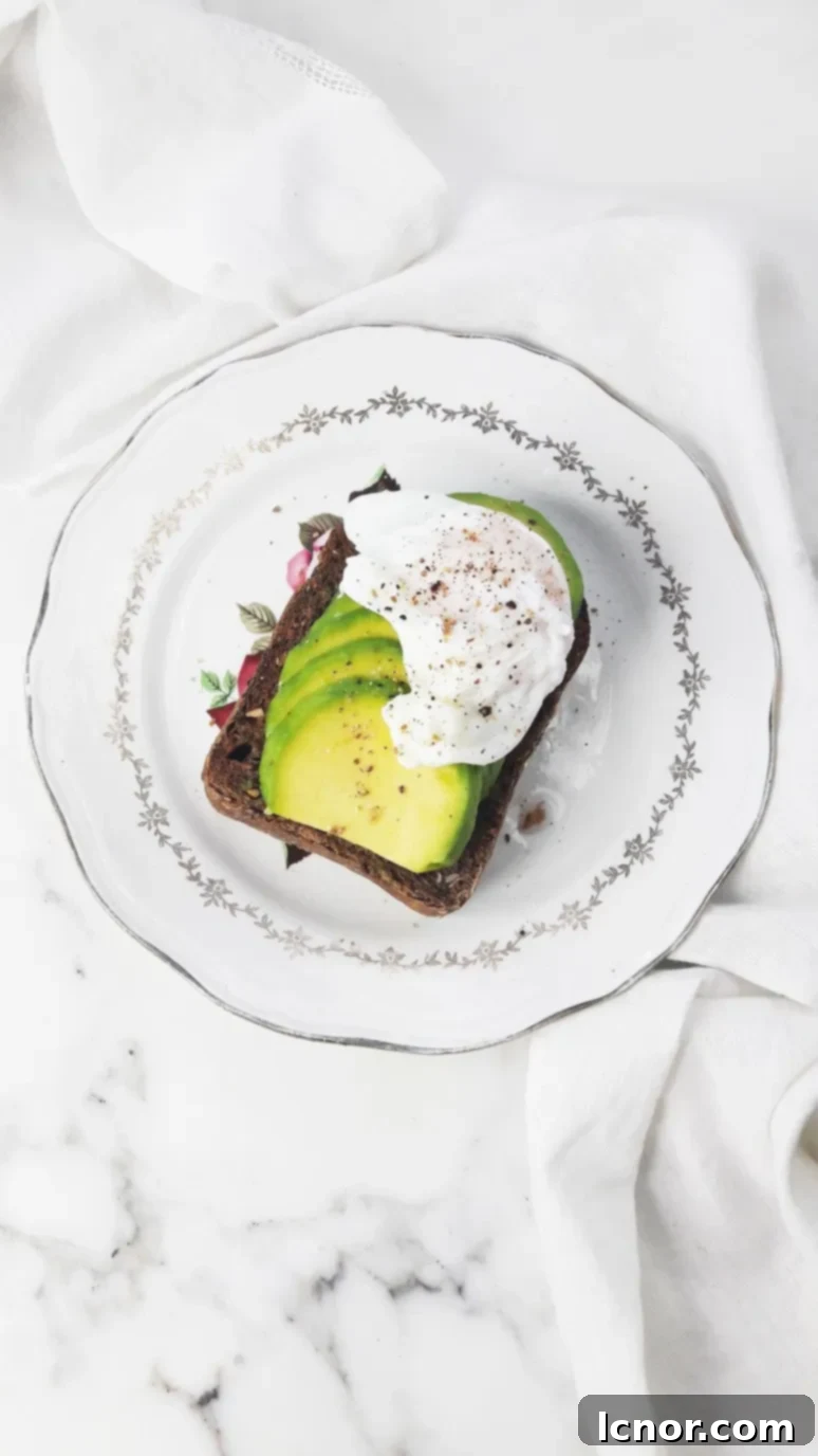 The BEST avocado toast recipe. This avocado toast is grainy, crunchy, has a layer of perfectly ripe, soft avocado and is topped with a runny poached egg. Avocado dreams do come true. | ahedgehoginthekitchen.com