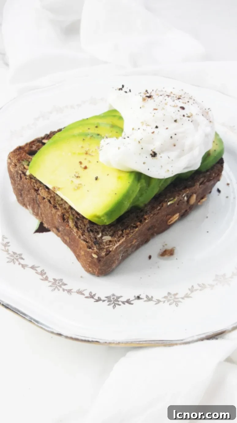The BEST avocado toast recipe. This avocado toast is grainy, crunchy, has a layer of perfectly ripe, soft avocado and is topped with a runny poached egg. Avocado dreams do come true. | ahedgehoginthekitchen.com