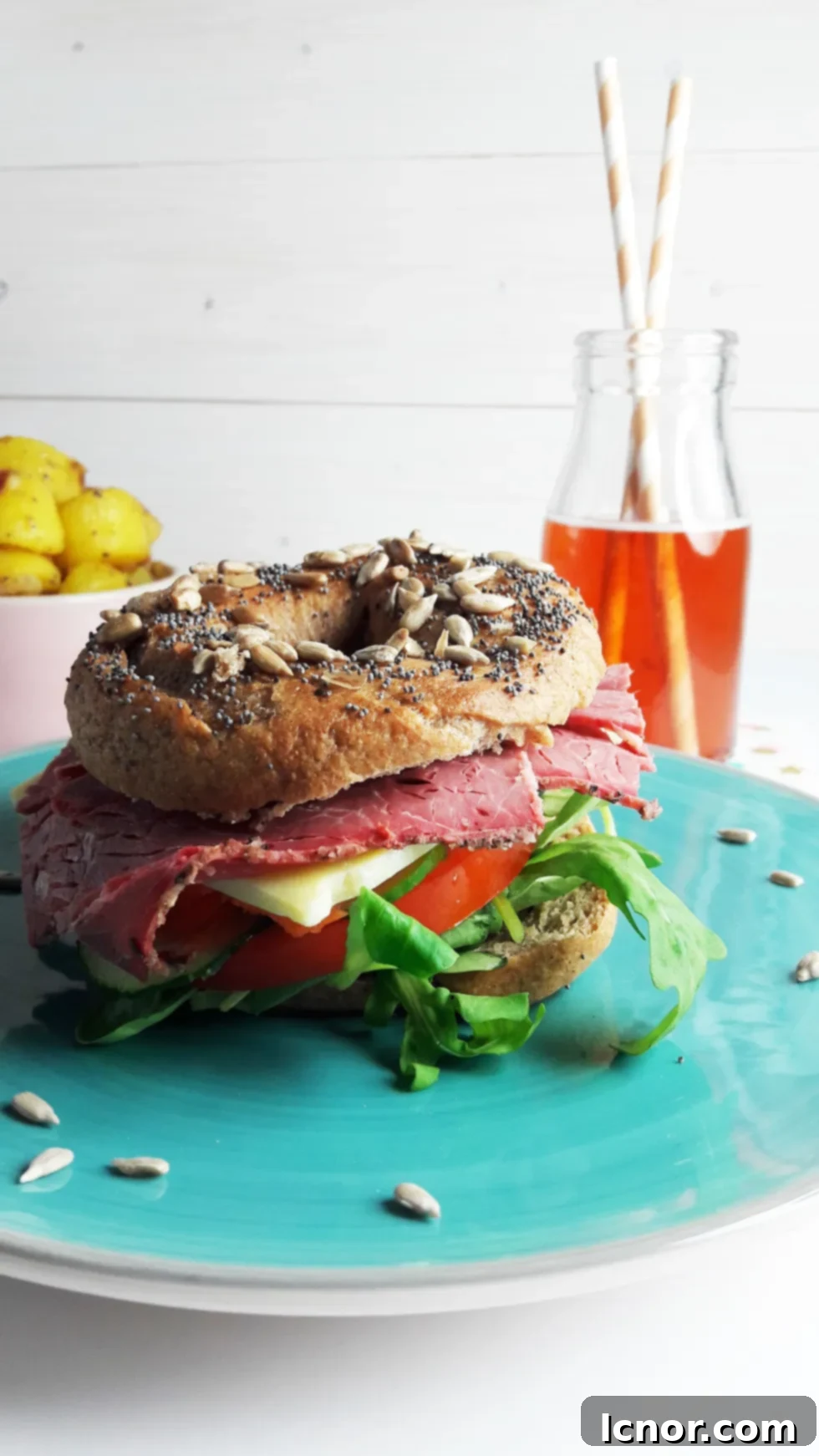 Freshly baked wholewheat bagels, ready to be sliced and filled.