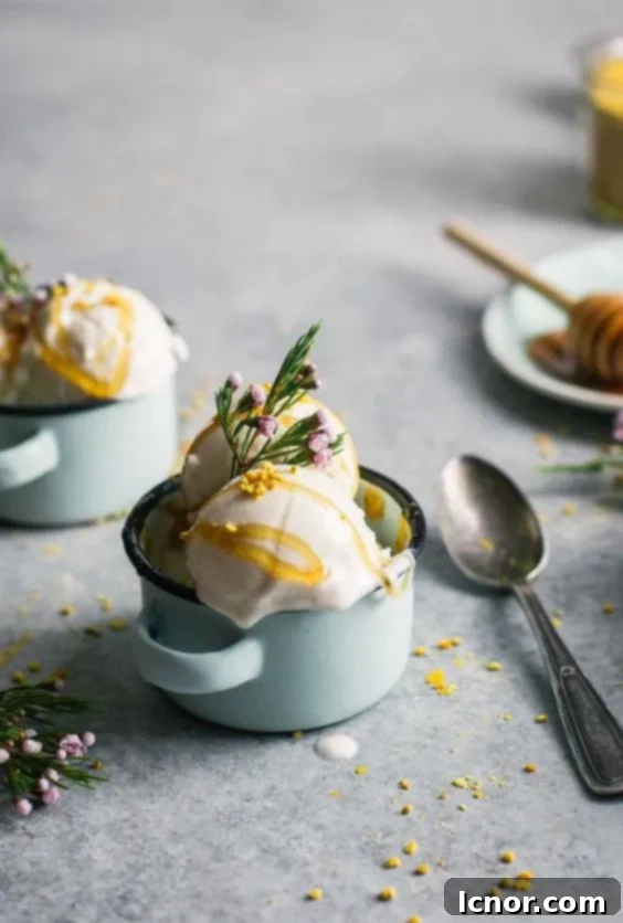 Creamy salted honey chamomile frozen yogurt topped with golden bee pollen, a unique and healthy dessert.