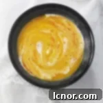 French pumpkin soup with a white lace background