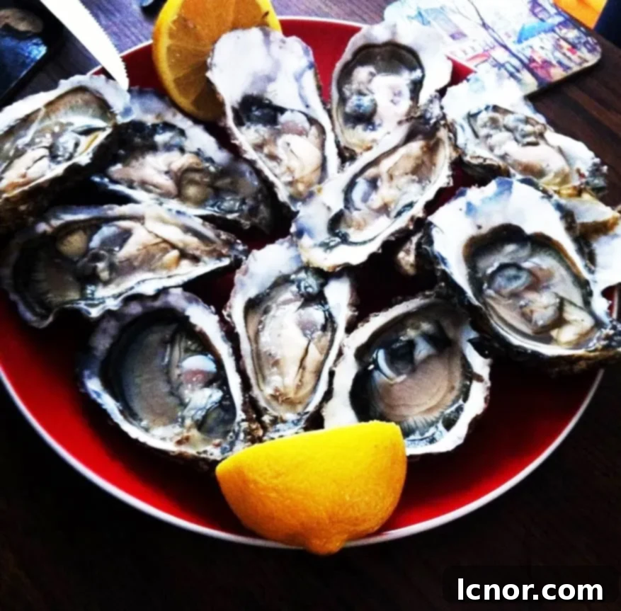 Fresh oysters and white wine, a classic pairing at Marché d'Aligre.