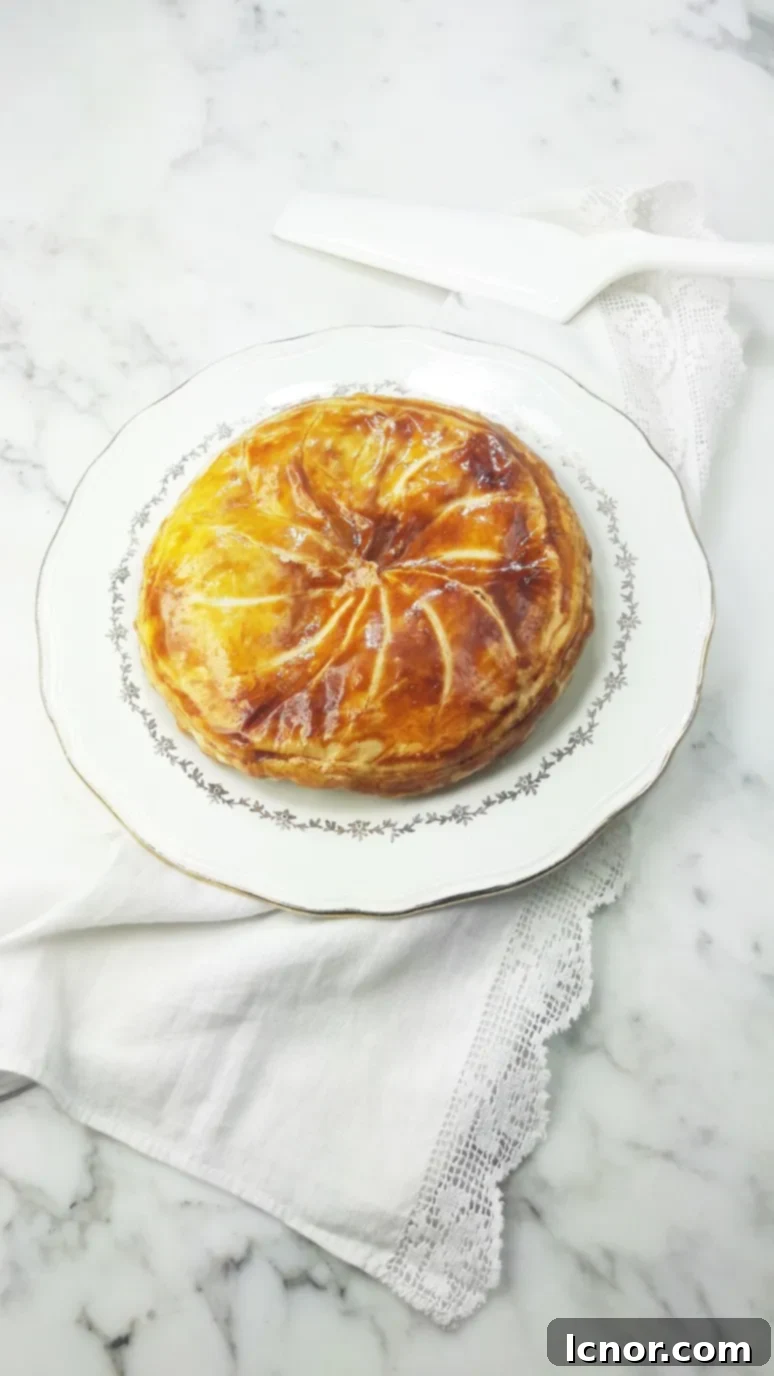 A beautifully presented caramelized apple galette des rois, perfect for sharing. | ahedgehoginthekitchen.com
