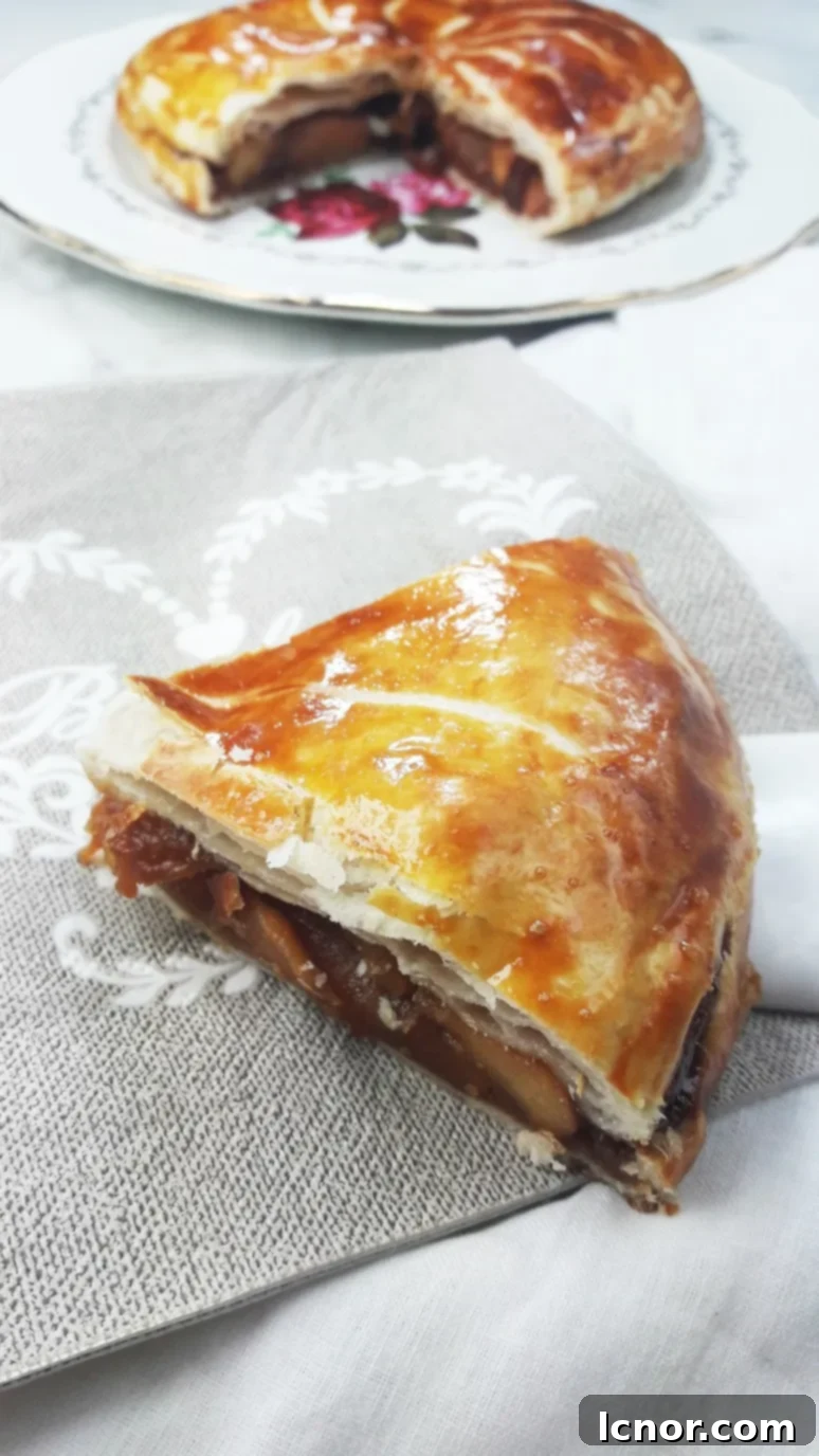 A close-up of the delicate scoring on a caramelized apple galette des rois. | ahedgehoginthekitchen.com
