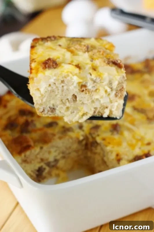 Romantic breakfast ideas for Valentine's Day? Overnight Sausage, Egg + Hash Brown Breakfast Casserole. | ahedgehoginthekitchen.com