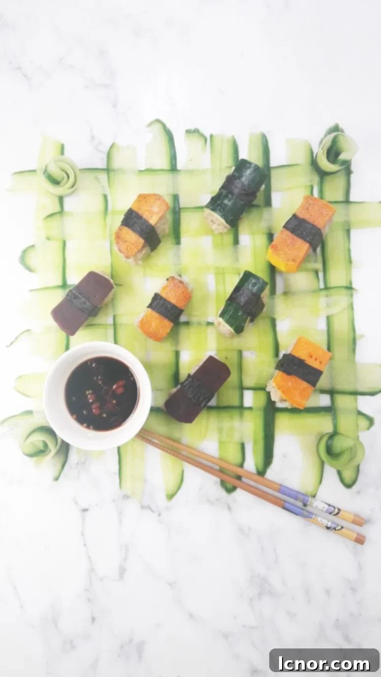 A grand vegan sushi platter arranged on an edible woven cucumber mat, showcasing colorful sushi pieces and garnishes.