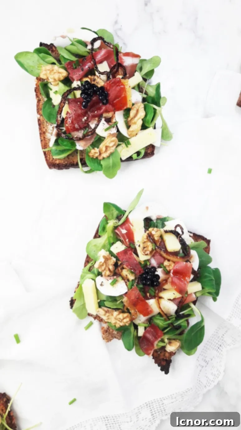 A beautifully presented Bayonne Ham Laguiole Cheese & Balsamic Vinegar Tartine, ready to elevate your snack break.