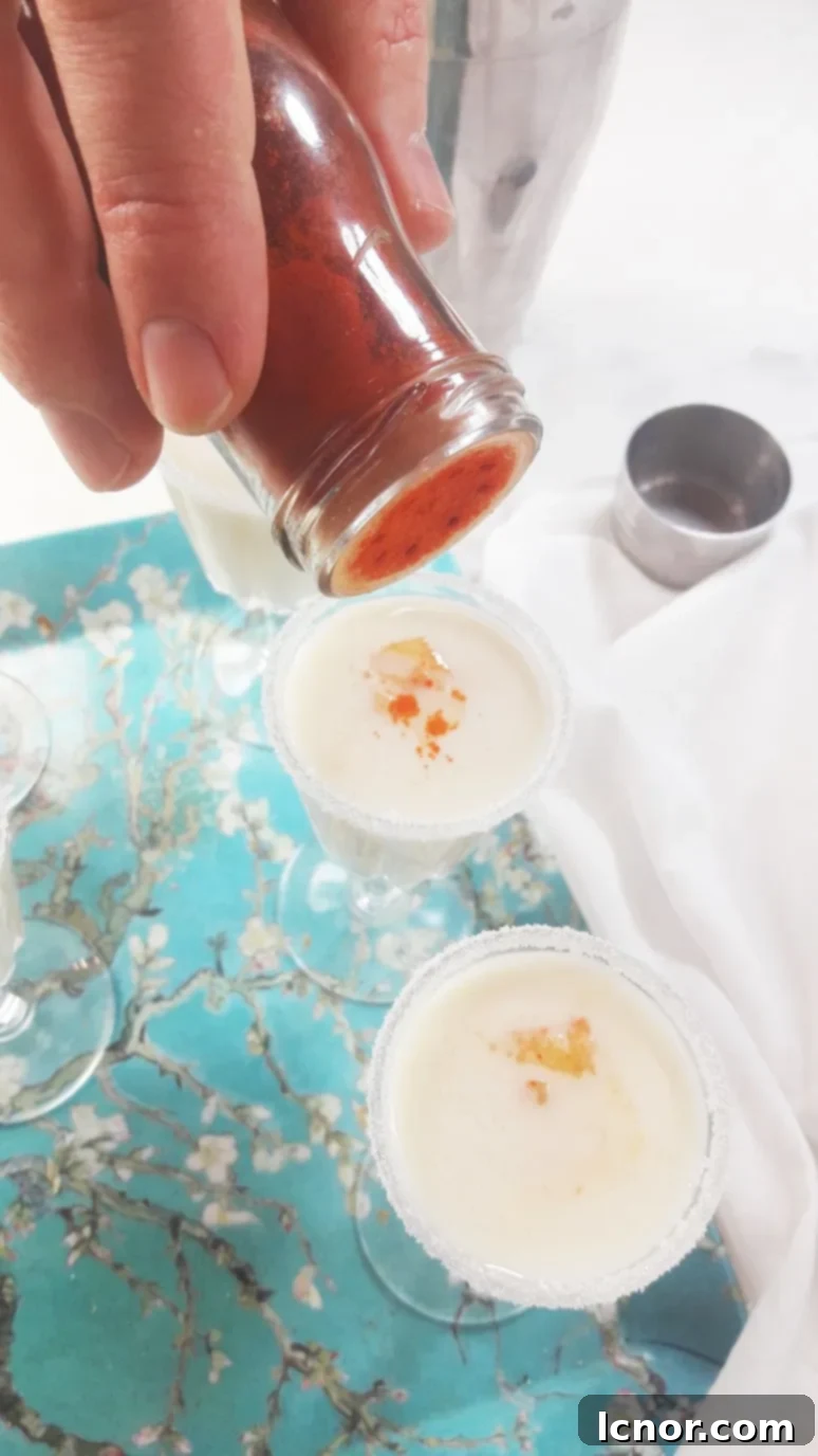 Mini Pina Colada garnished with fresh pineapple, evoking a summer vibe.
