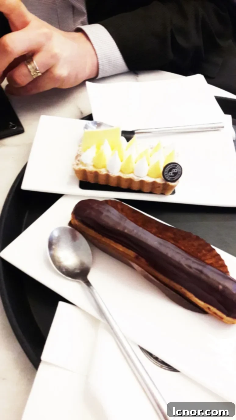 The inviting ambiance inside Paris Baguette, featuring elegant Parisian details and a contemporary aesthetic.