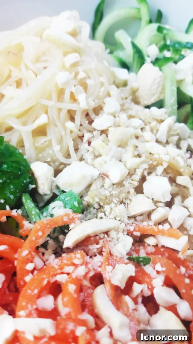 Asian spiralized vegetable noodle salad. The perfect healthy lunch or dinner! | ahedgehoginthekitchen.com