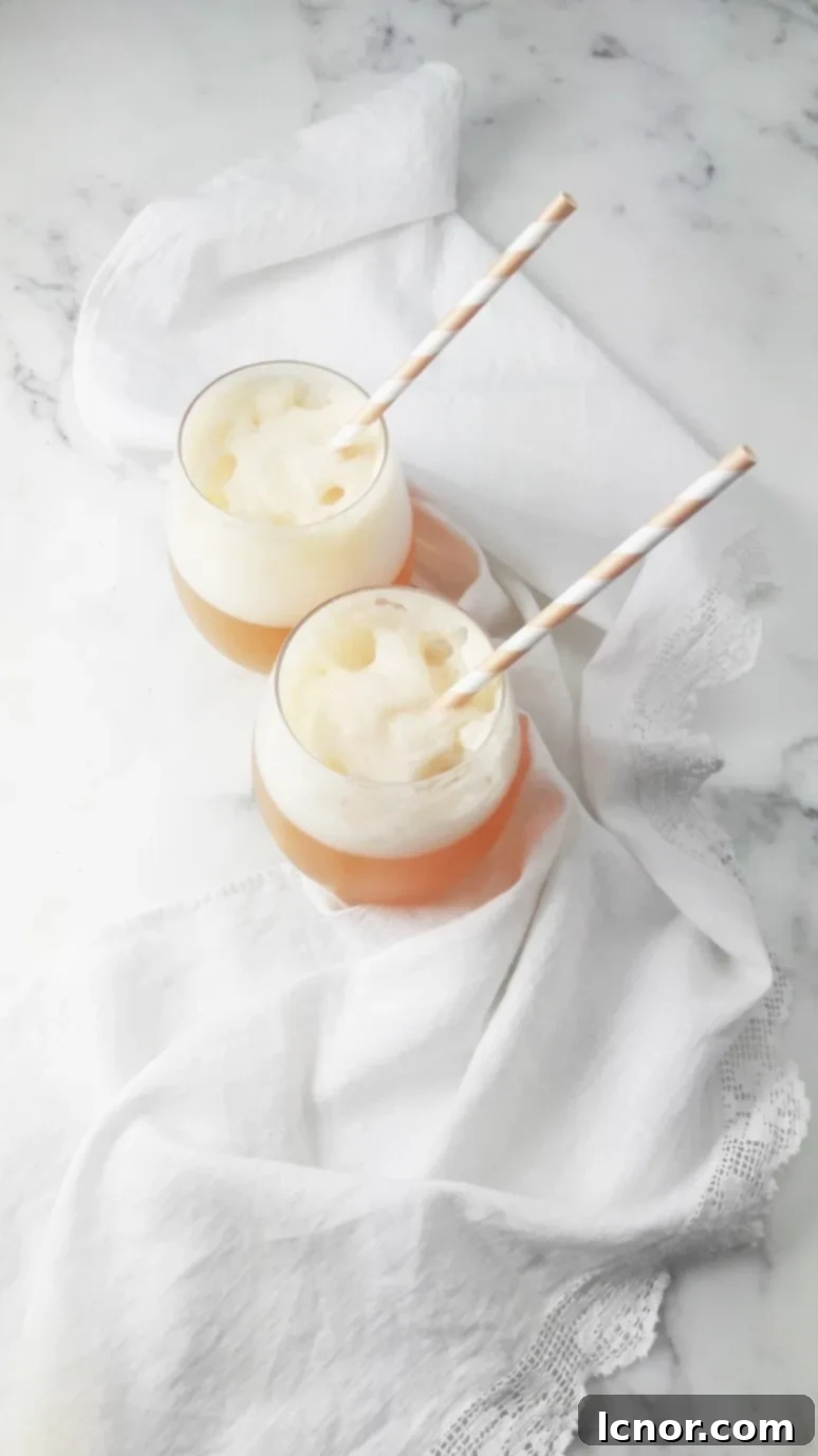 This frozen apple cider cocktail with lemon is the perfect refreshing cocktail for Spring and Summer! It is a lovely, cool twist on a classic French kir. | ahedgehoginthekitchen.com