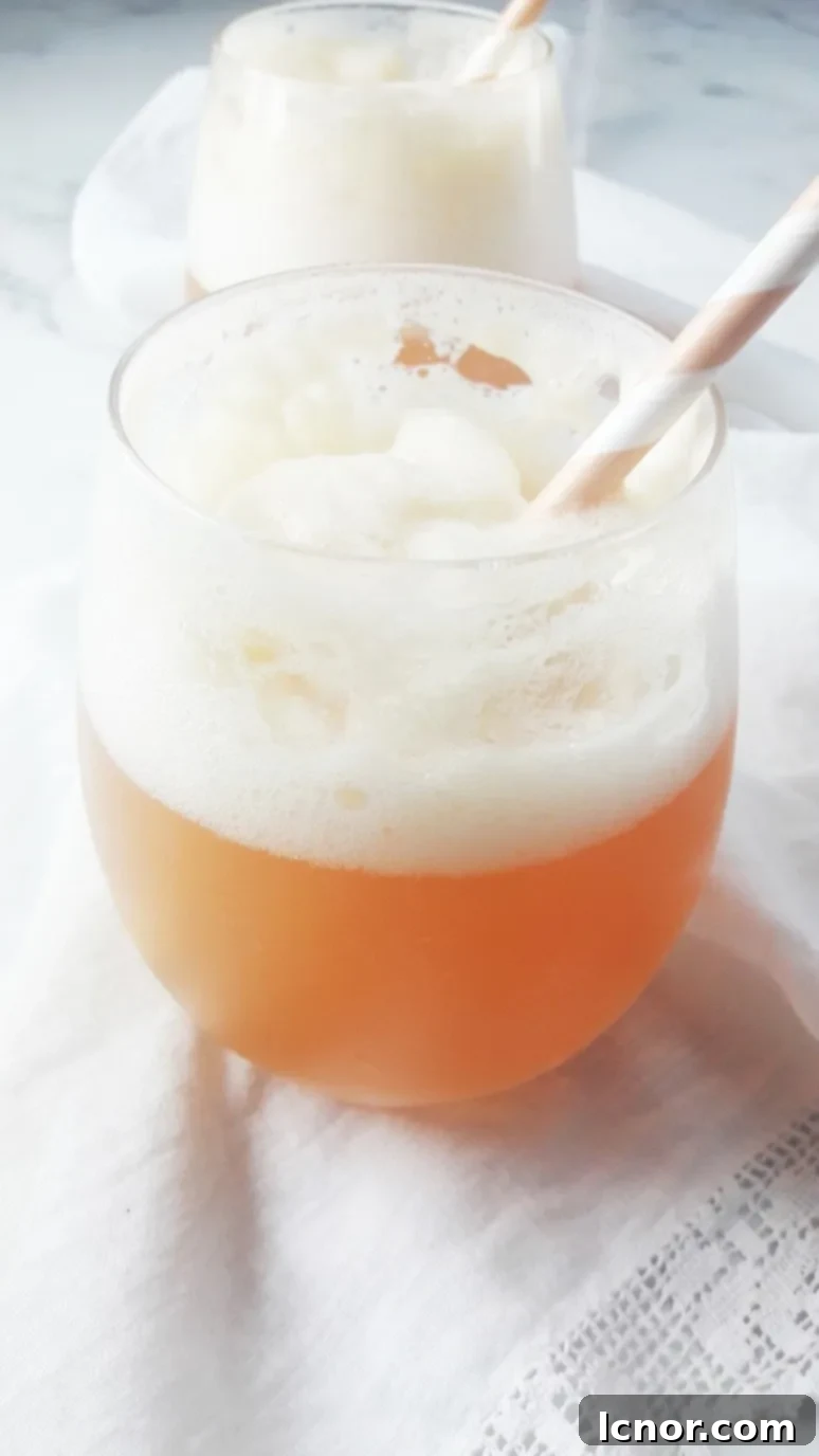 This frozen apple cider cocktail with lemon is the perfect refreshing cocktail for Spring and Summer! It is a lovely, cool twist on a classic French kir. | ahedgehoginthekitchen.com