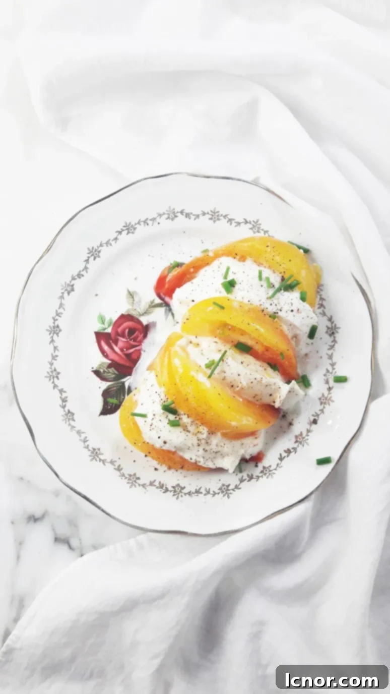This heirloom yellow tomato mozzarella salad is naturally healthy, beautifully colored and packed with flavor and nutrients! Enjoy this refreshing Caprese twist. | ahedgehoginthekitchen.com