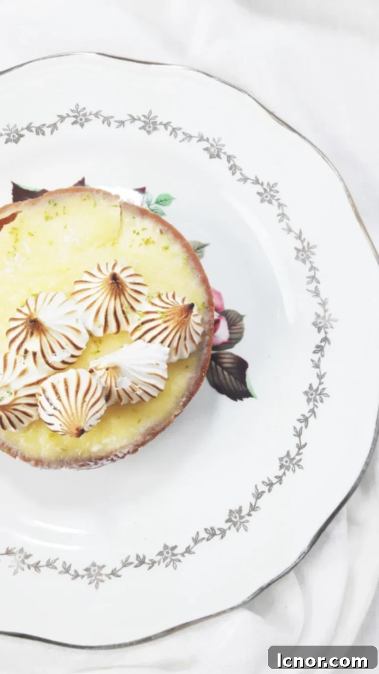Vibrant organic lemon meringue tart from Panifica Bakery, a must-try organic pastry in Paris. | ahedgehoginthekitchen.com