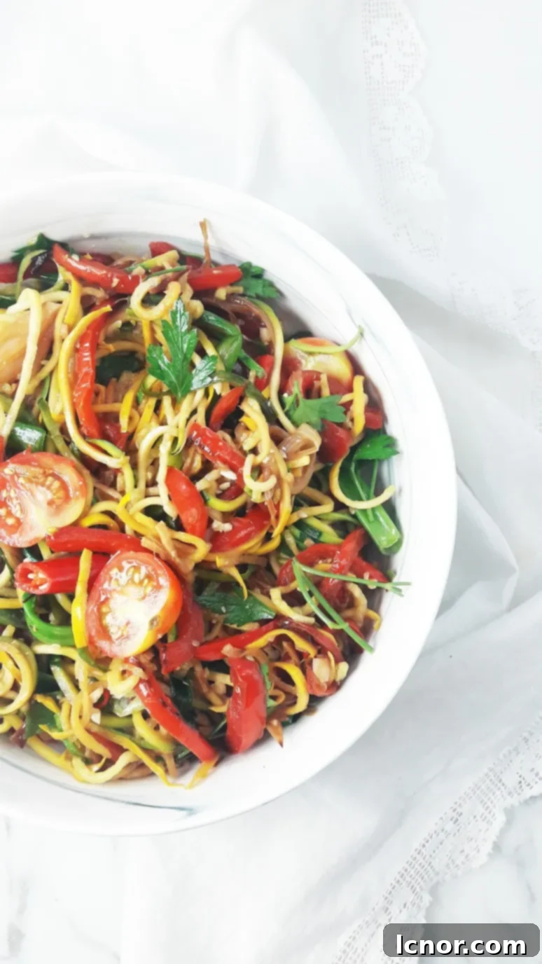 Thai zoodles spiralized zucchini noodles with tomato & pepper. ahedgehoginthekitchen.com