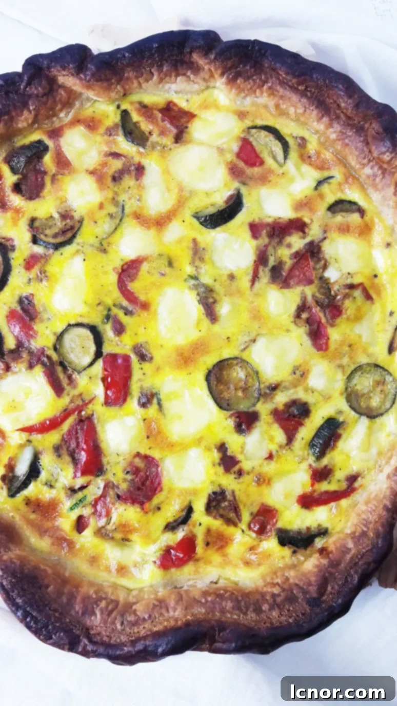 Blissful mediterranean quiche. Red pepper, red onion, garlic, zucchini & tomato make this quiche tasty & nutritious. | ahedgehoginthekitchen.com