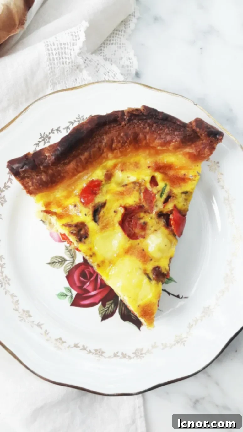 Blissful mediterranean quiche. Red pepper, red onion, garlic, zucchini & tomato make this quiche tasty & nutritious. | ahedgehoginthekitchen.com