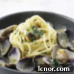 Spaghetti alle Vongole, a classic Italian clam pasta recipe card image
