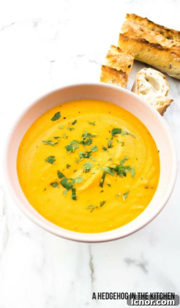 Creamy Carrot Coconut Curry Soup 3 Coconut Curry Soup #veganrecipes #coconutmilk #coconutcream #vegetarianrecipes. ahedgehoginthekitchen.com