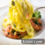 Creamy Shrimp Fettuccine Alfredo, an easy and delicious dinner recipe with pasta, shrimp, and rich Alfredo sauce.
