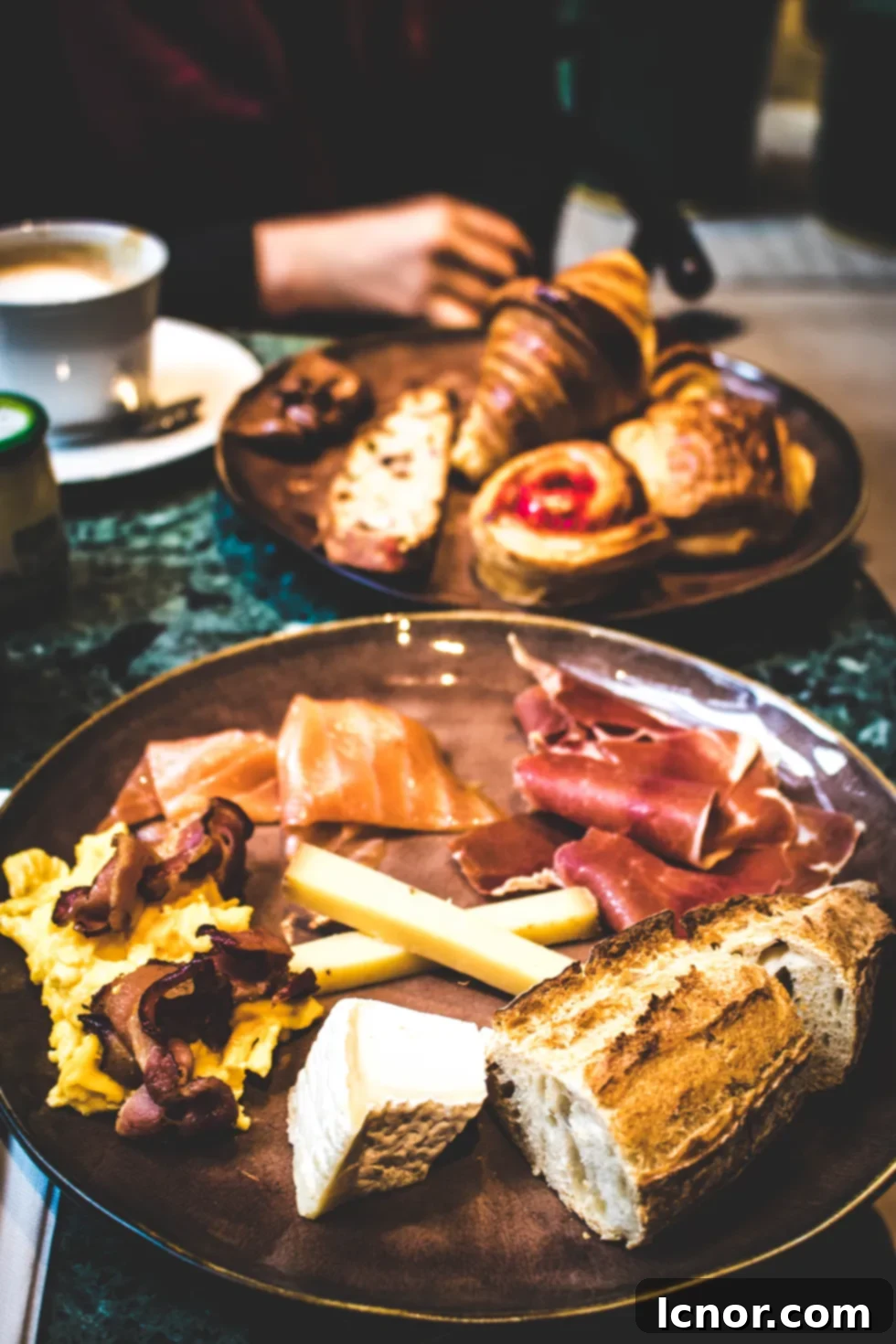 Delectable Parisian breakfast spread at Hotel Parister, perfect for couples