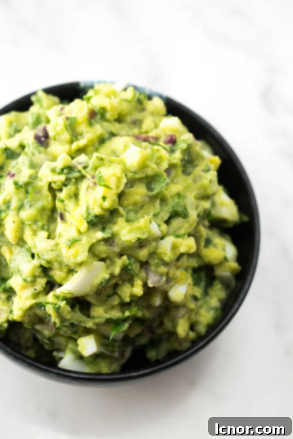 Creamy Nicaraguan Guacamole with Hard-Boiled Eggs, Cilantro, and Lime
