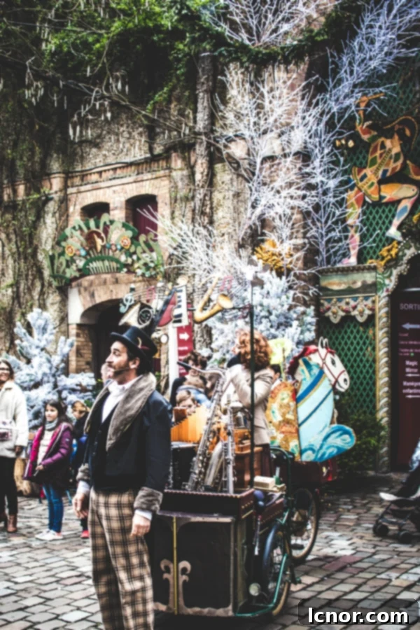 Outdoor courtyard at Le Festival du Merveilleux with festive lighting and food stalls, creating a warm ambiance