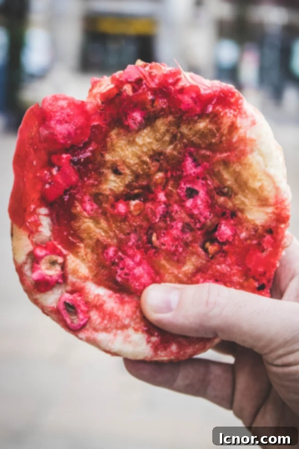 things to do in Lyon, try the Praluline rose pink praline brioche in Lyon