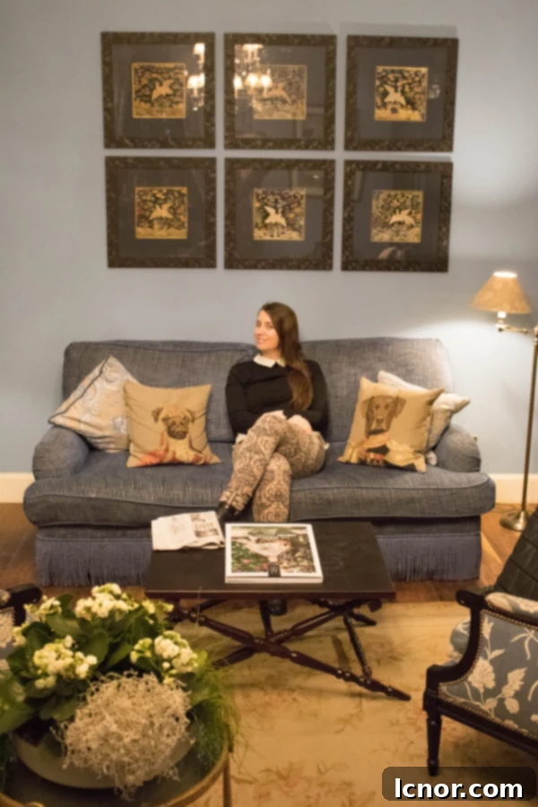 Visit Lyon, woman sitting on sofa in hotel (what to do in Lyon)