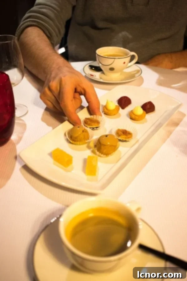 Assortment of mini desserts and coffee, a classic French café gourmand