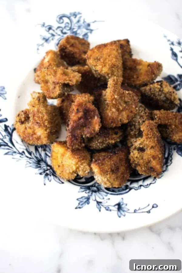 Breaded Mushrooms on a blue and white plate