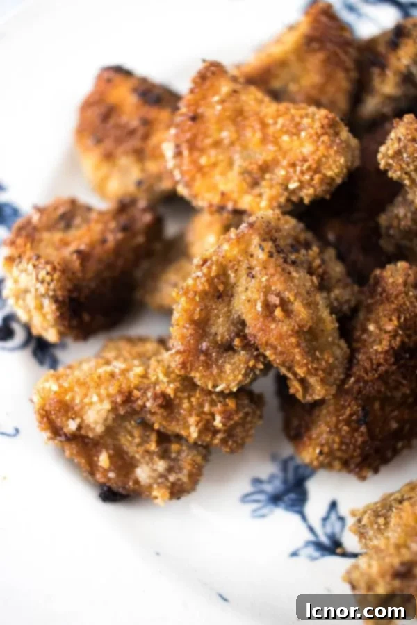 Breaded Mushrooms on a blue and white plate