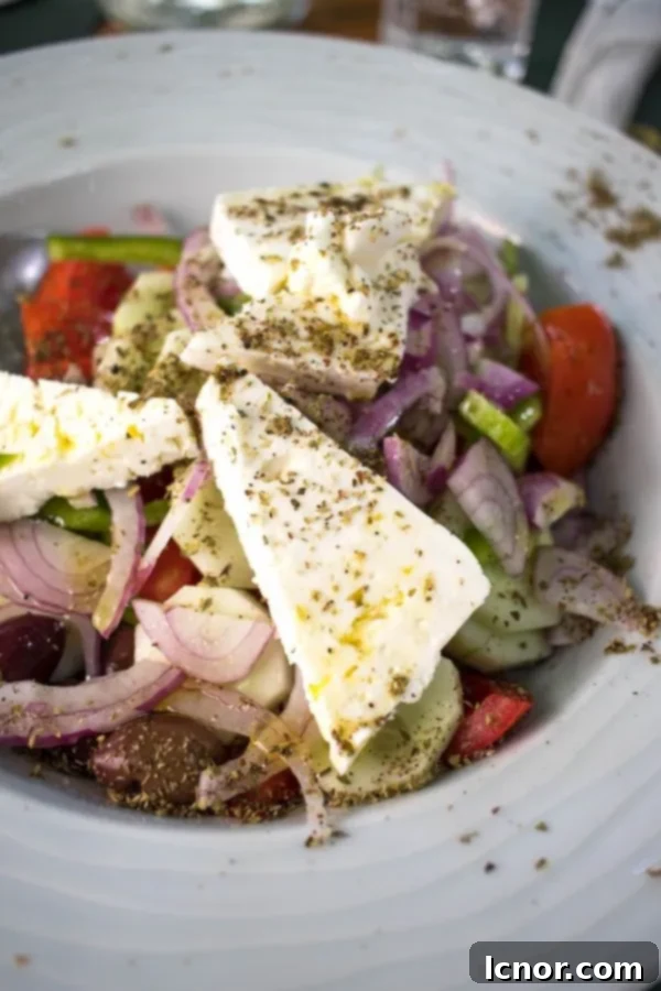 Traditional Greek Salad, the perfect Athens food, vegetables topped with feta cheese.