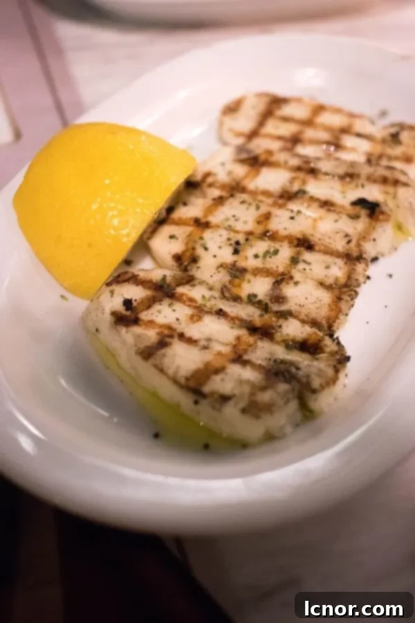 Grilled cheese topped with lemon juice