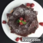 Chocolate Ganache and Raspberry Caramel Shortbread Tart - a decadent French dessert.