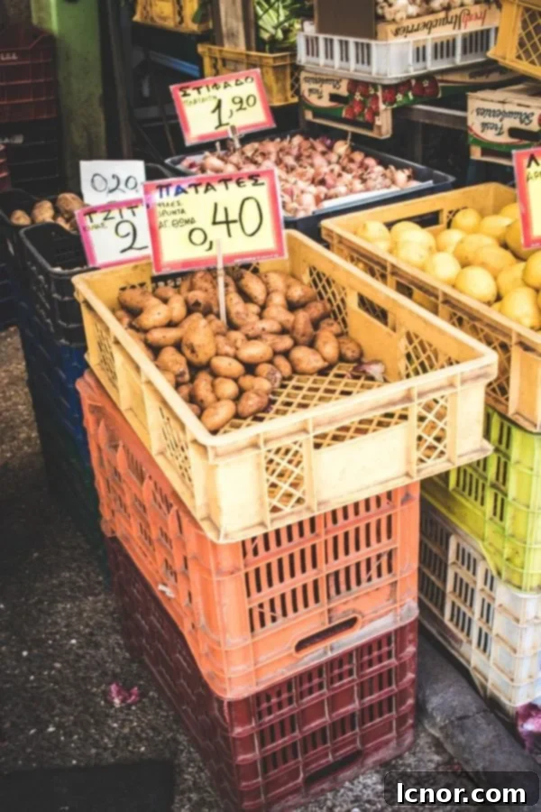 Athens Central Food Market: 10 Must-Visit Reasons 11 Piles of fresh potatoes at the Central Market in Athens Greece, ready for purchase.